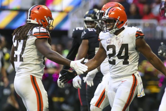 Oct 2, 2022; Atlanta, Georgia, USA; Cleveland Browns running back Nick Chubb (24) celebrates after a touchdown with running back Kareem Hunt (27) against the Atlanta Falcons in the second half at Mercedes-Benz Stadium. Mandatory Credit: Brett Davis-USA TODAY Sports